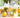 Homemade Limoncello bottles with lemons around and small drinking glasses